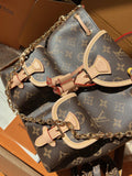 LV Excursion PM Monogram Canvas Backpack Shoulder Bag with Leather Trim and Drawstring Closure