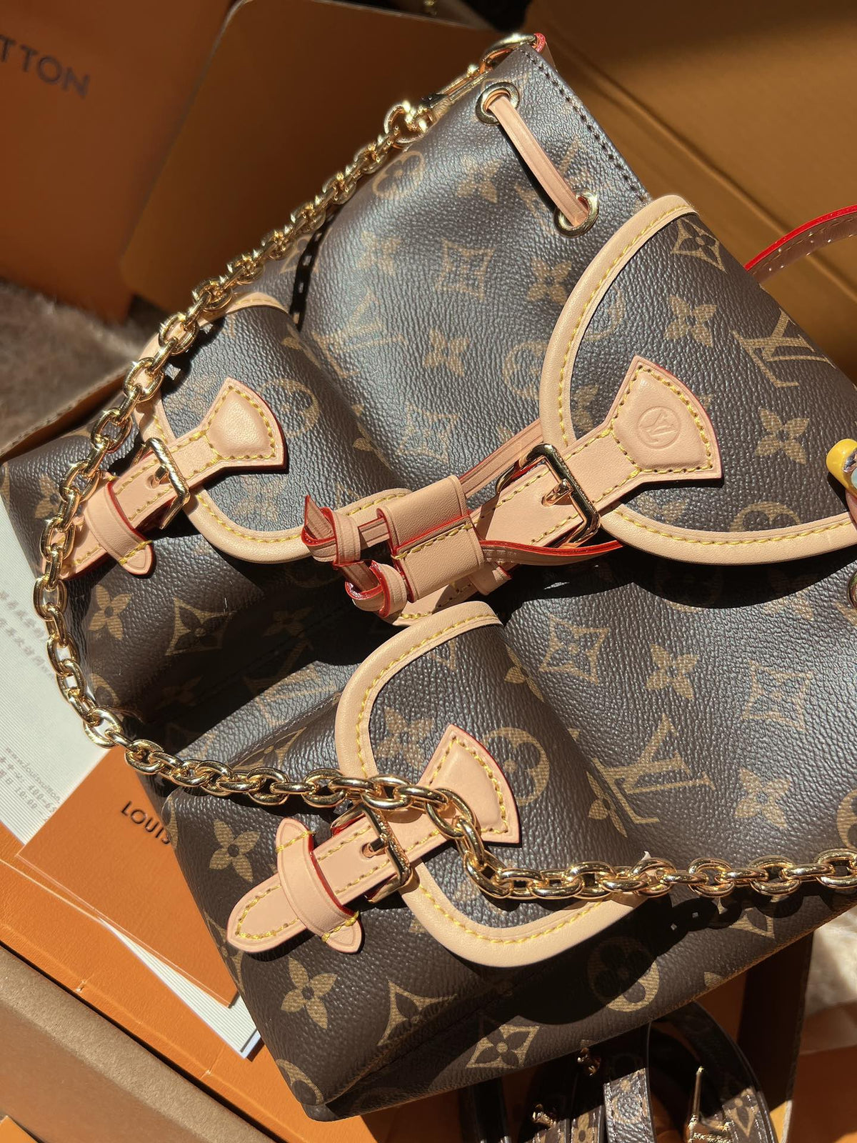 LV Excursion PM Monogram Canvas Backpack Shoulder Bag with Leather Trim and Drawstring Closure
