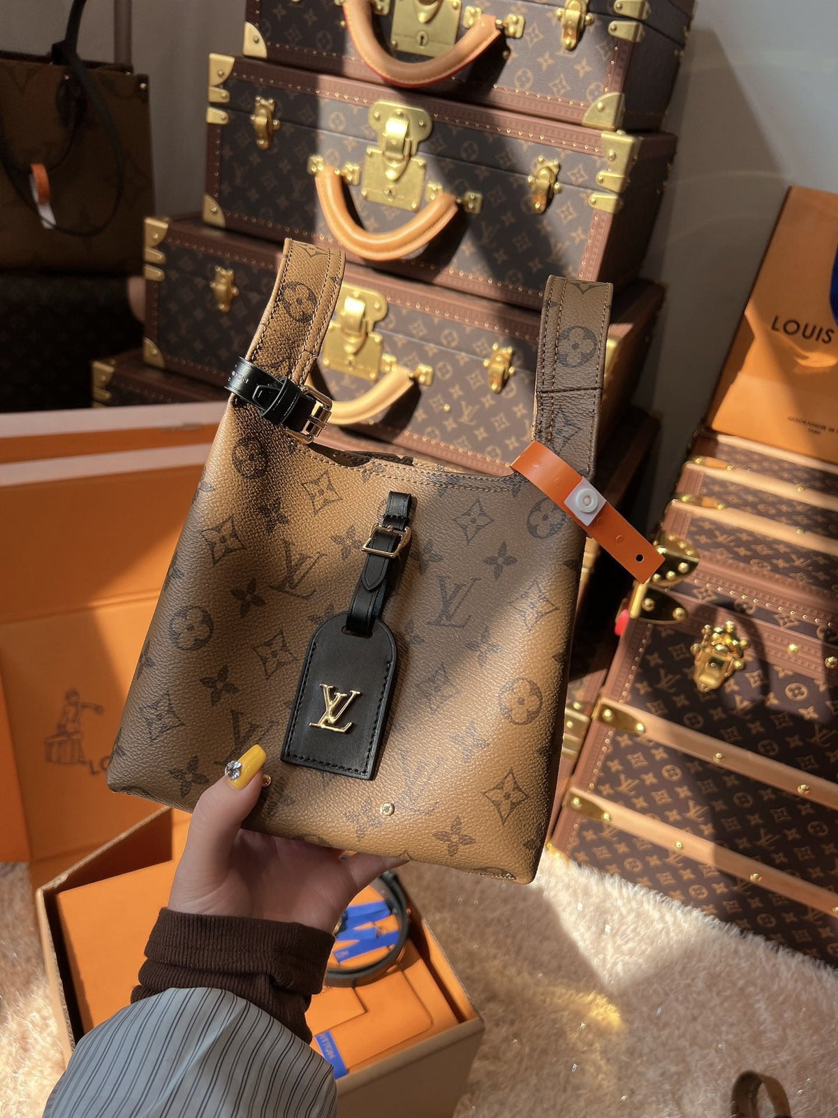 LV Sac Plat MM Monogram Reverse Tote with Black Leather Trim