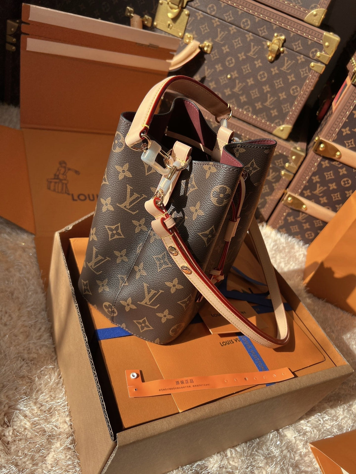 LV Neonoé Monogram Canvas Bucket Bag with Leather Trim and Shoulder Strap
