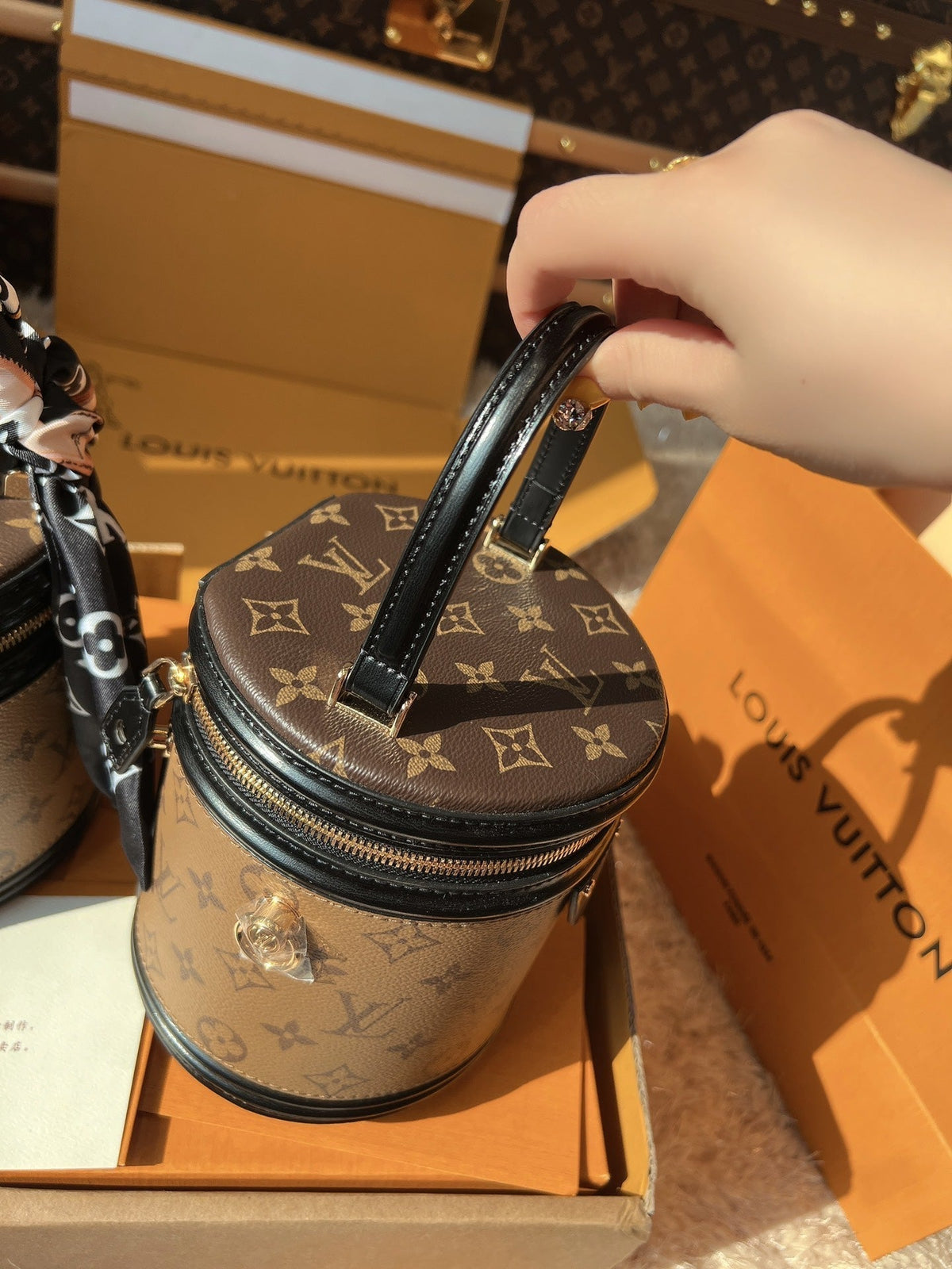 LV Cannes Monogram Reverse Canvas Round Top Handle Bag with Leather Trim and Shoulder Strap