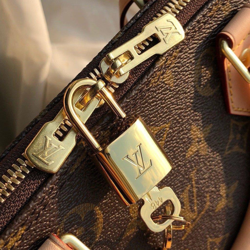 Louis Vuitton Alma BB Monogram Handbag