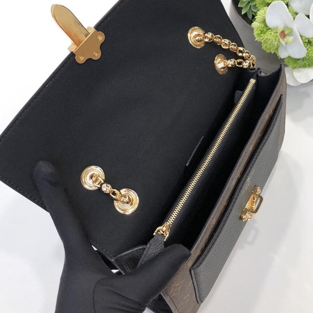 Louis Vuitton Victoire Handbag