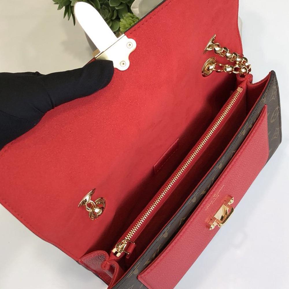 Louis Vuitton Victoire Handbag