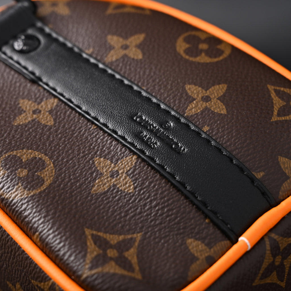 Louis Vuitton Keepall Bandoulière 50 – Monogram Canvas with Neon Orange Trim Travel Bag
