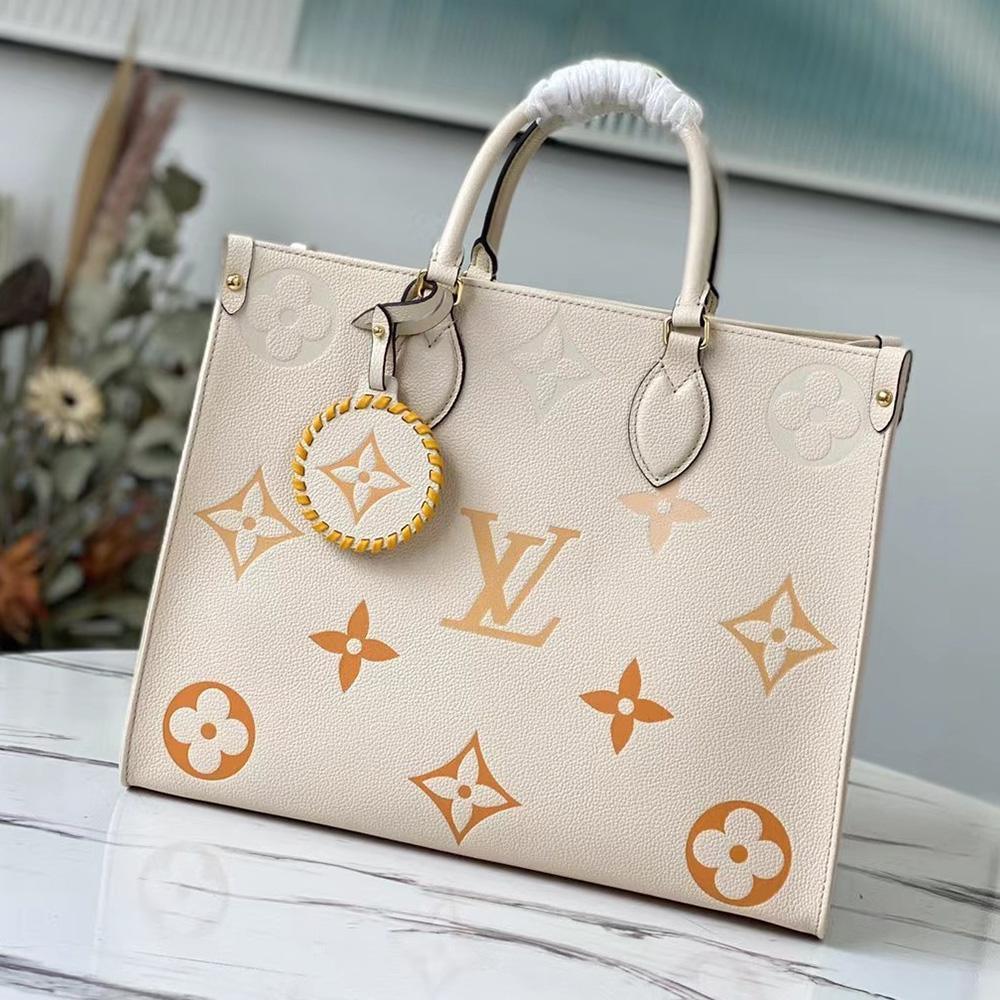 Louis Vuitton OnTheGo MM Tote Bag - Cream Saffron